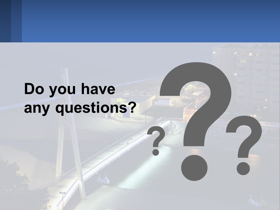 A Bridge Over A Body Of Water At Night PowerPoint Template