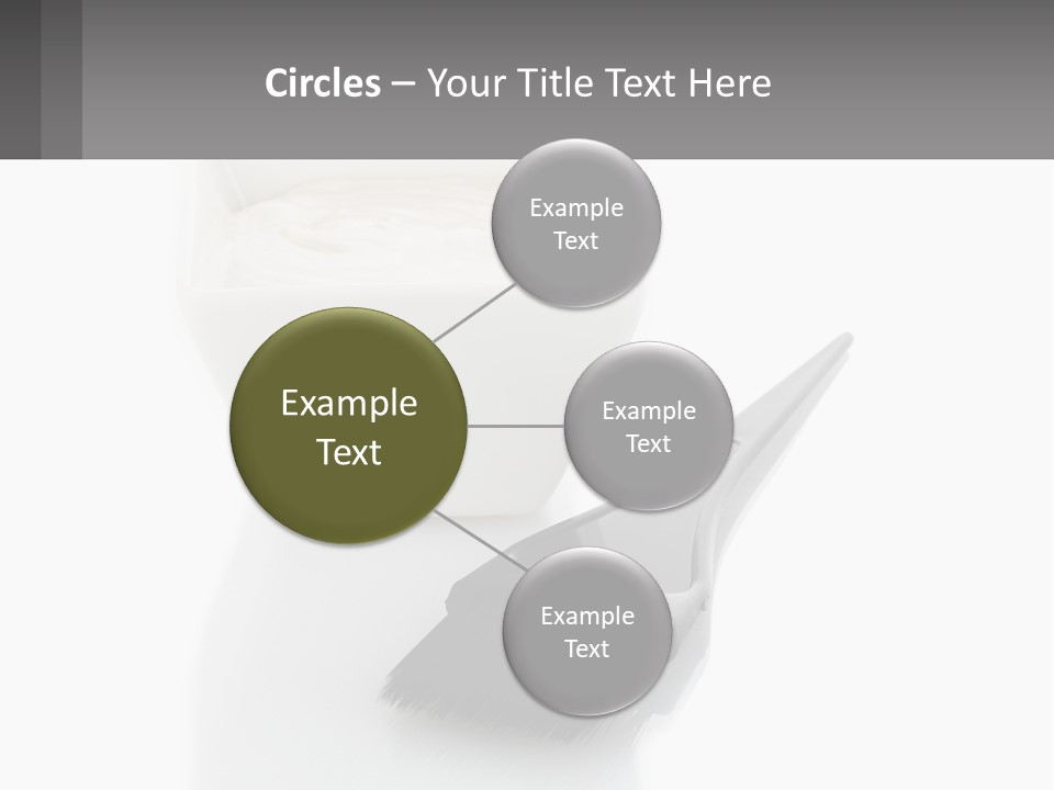 A White Bowl Of Cream Next To A Black Comb PowerPoint Template