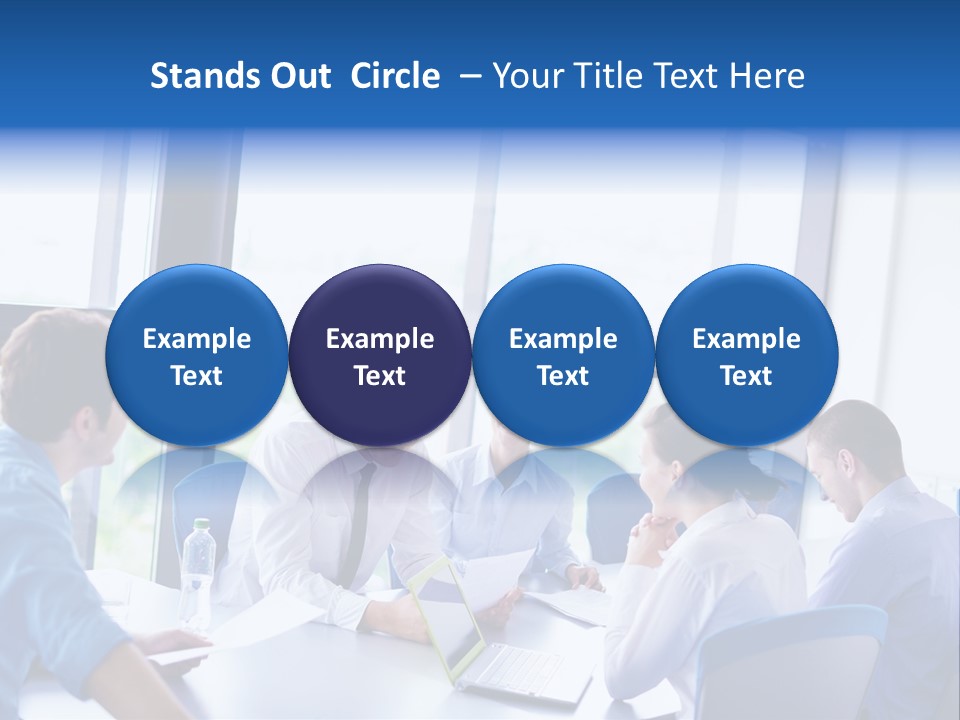 A Group Of People Sitting Around A Table Talking PowerPoint Template