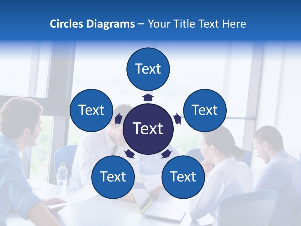 A Group Of People Sitting Around A Table Talking PowerPoint Template