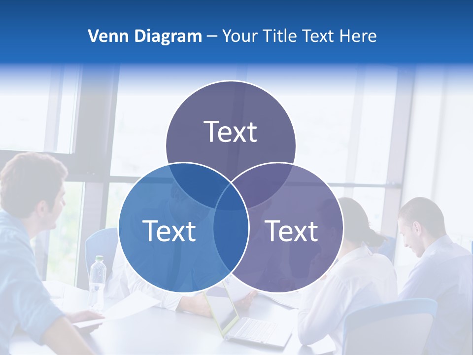 A Group Of People Sitting Around A Table Talking PowerPoint Template