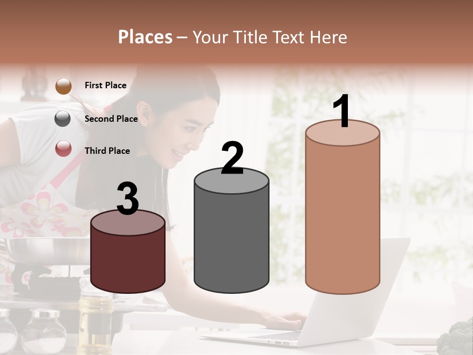 A Woman Using A Laptop On A Kitchen Counter PowerPoint Template