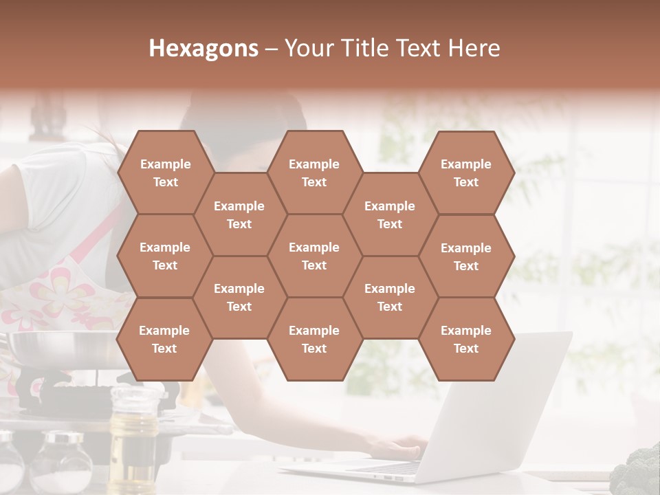 A Woman Using A Laptop On A Kitchen Counter PowerPoint Template