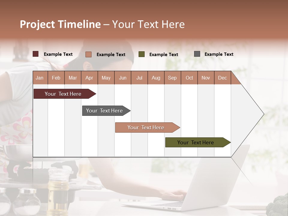 A Woman Using A Laptop On A Kitchen Counter PowerPoint Template
