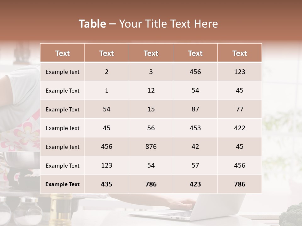 A Woman Using A Laptop On A Kitchen Counter PowerPoint Template