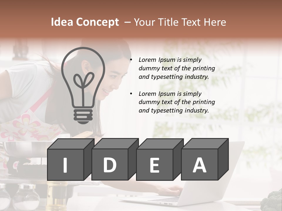 A Woman Using A Laptop On A Kitchen Counter PowerPoint Template