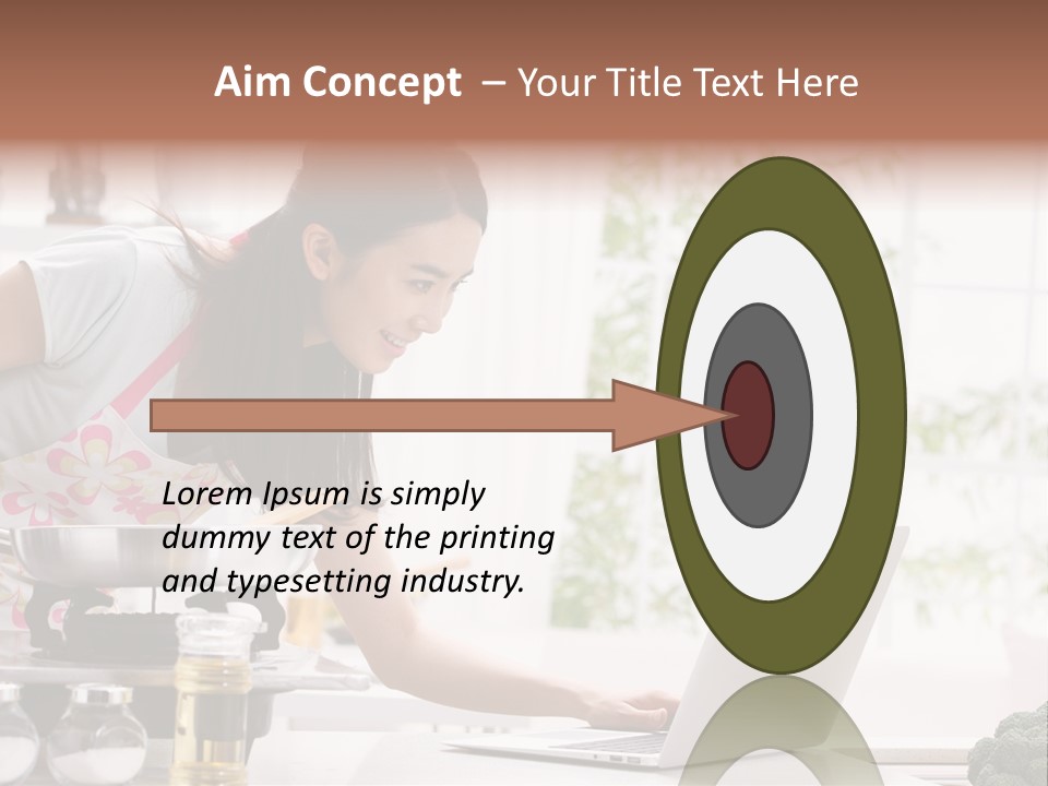 A Woman Using A Laptop On A Kitchen Counter PowerPoint Template