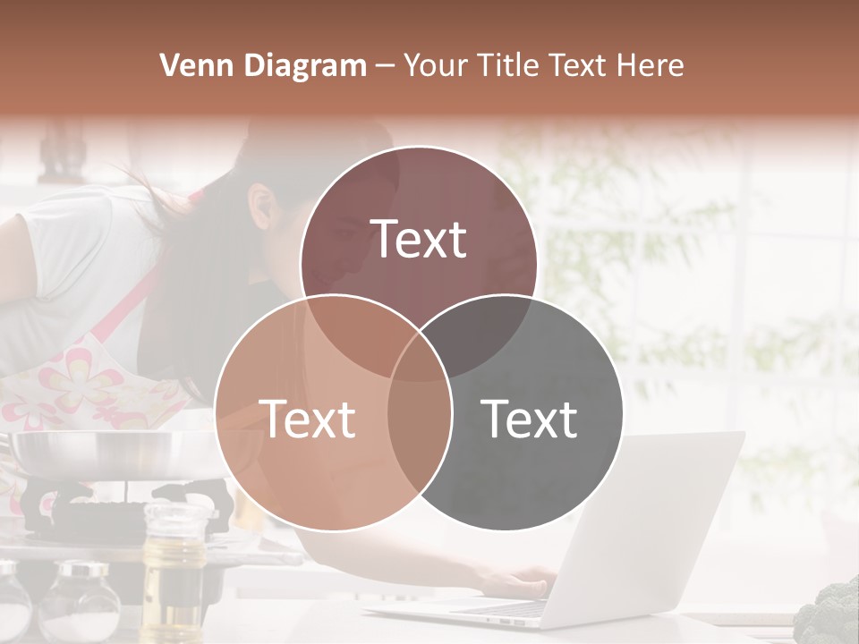 A Woman Using A Laptop On A Kitchen Counter PowerPoint Template