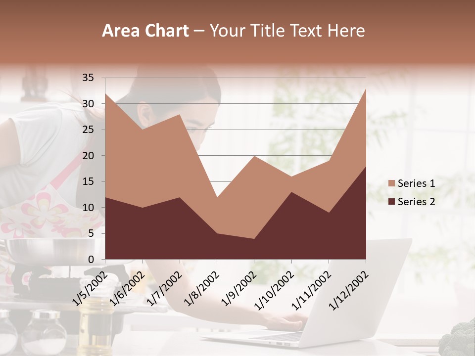 A Woman Using A Laptop On A Kitchen Counter PowerPoint Template