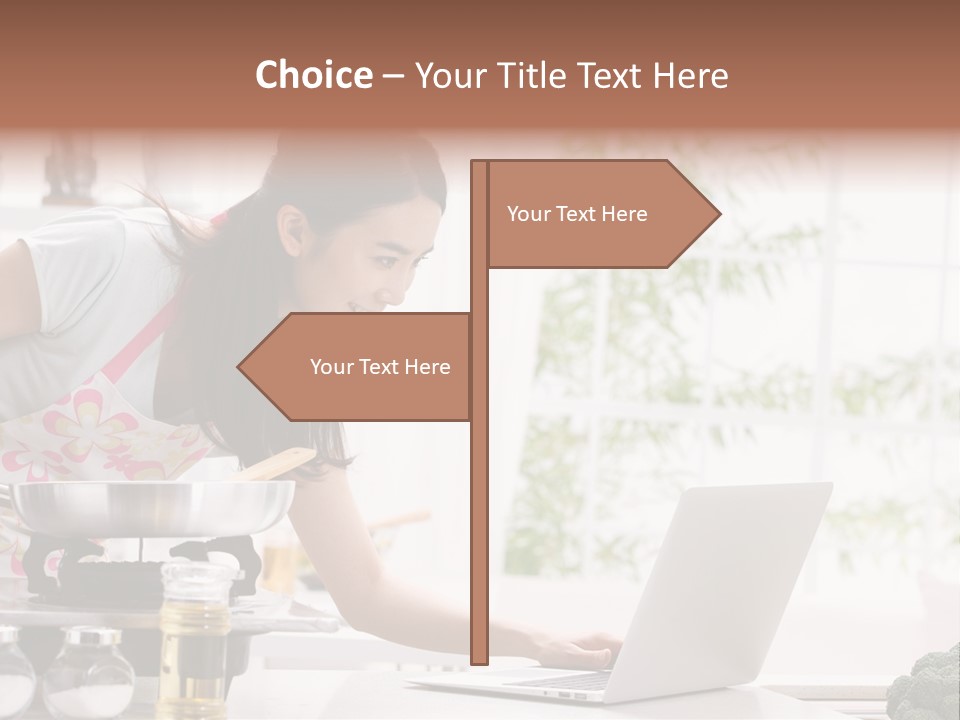 A Woman Using A Laptop On A Kitchen Counter PowerPoint Template