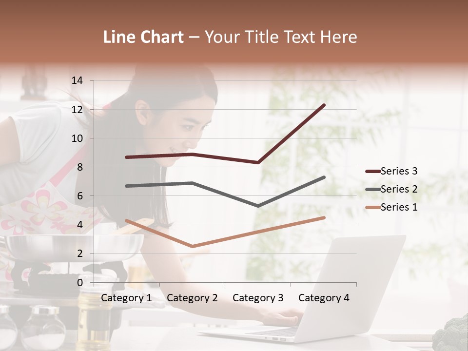A Woman Using A Laptop On A Kitchen Counter PowerPoint Template