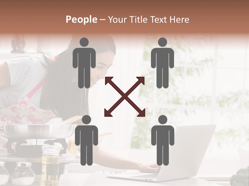 A Woman Using A Laptop On A Kitchen Counter PowerPoint Template