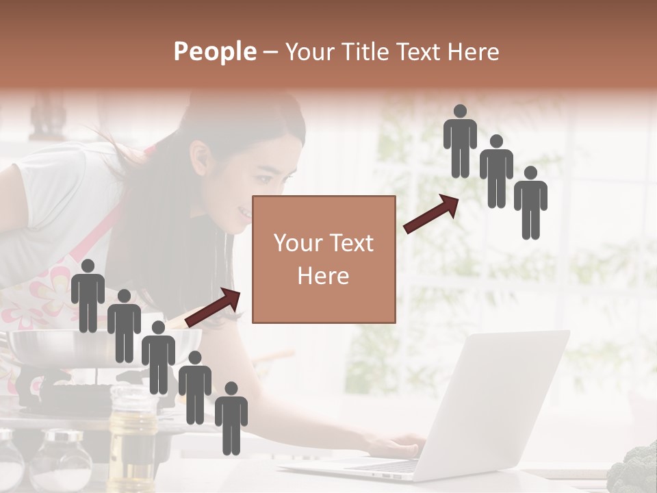 A Woman Using A Laptop On A Kitchen Counter PowerPoint Template
