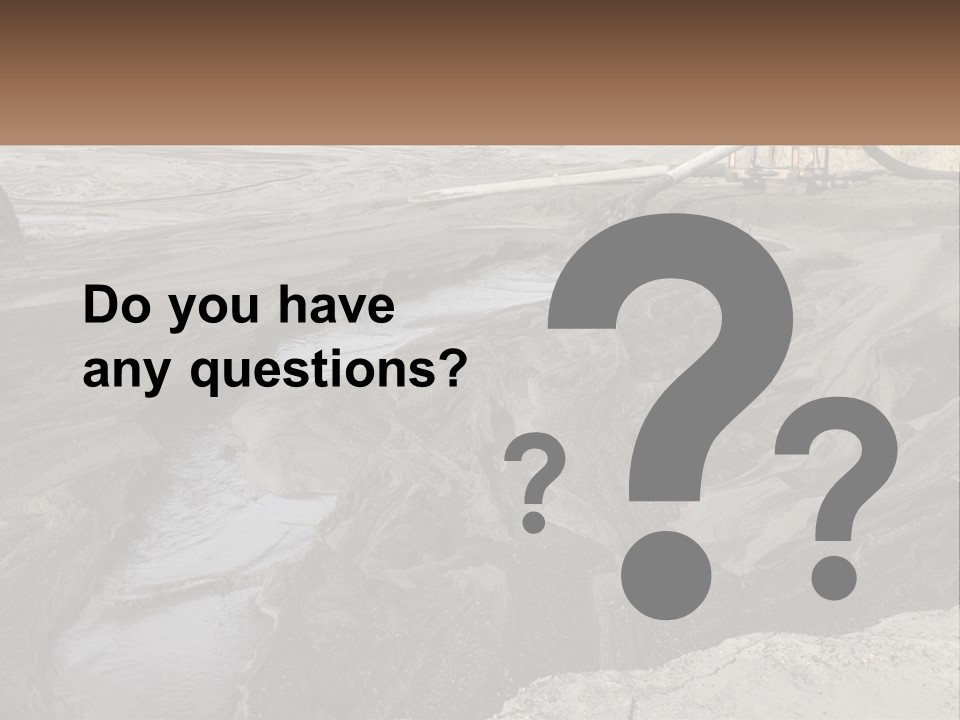 A Large Open Pit Filled With Water And Dirt PowerPoint Template
