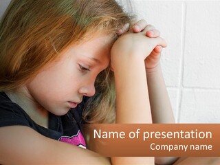 A Young Girl Is Holding Her Head In Her Hands PowerPoint Template