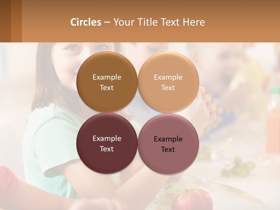 A Group Of Children Sitting At A Table Eating Food PowerPoint Template