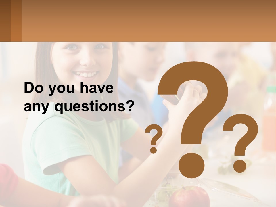 A Group Of Children Sitting At A Table Eating Food PowerPoint Template