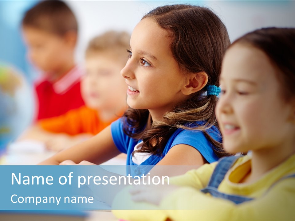 A Group Of Children Sitting At A Table With A Globe In The Background PowerPoint Template