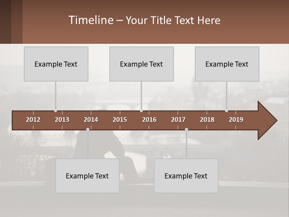 A Man Sitting On A Bench Talking On A Cell Phone PowerPoint Template