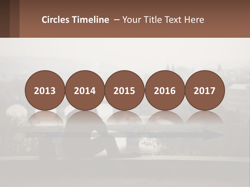 A Man Sitting On A Bench Talking On A Cell Phone PowerPoint Template