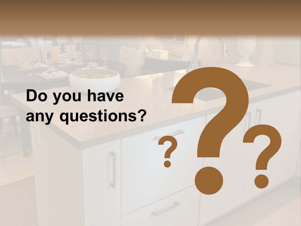 A Kitchen With A Center Island And A Sink PowerPoint Template