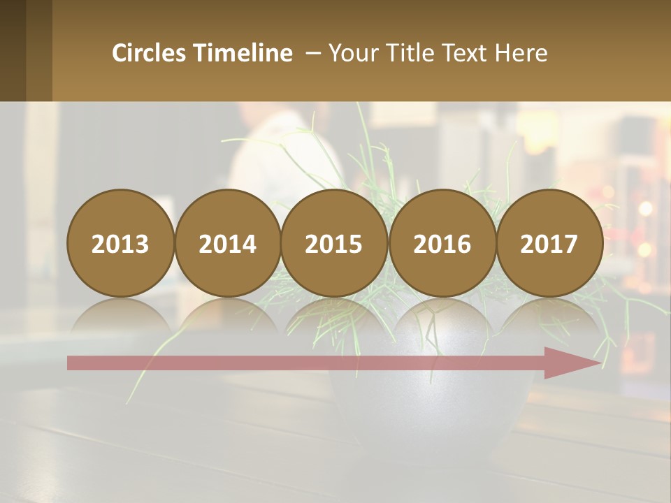 A Plant Is In A Vase On A Table PowerPoint Template