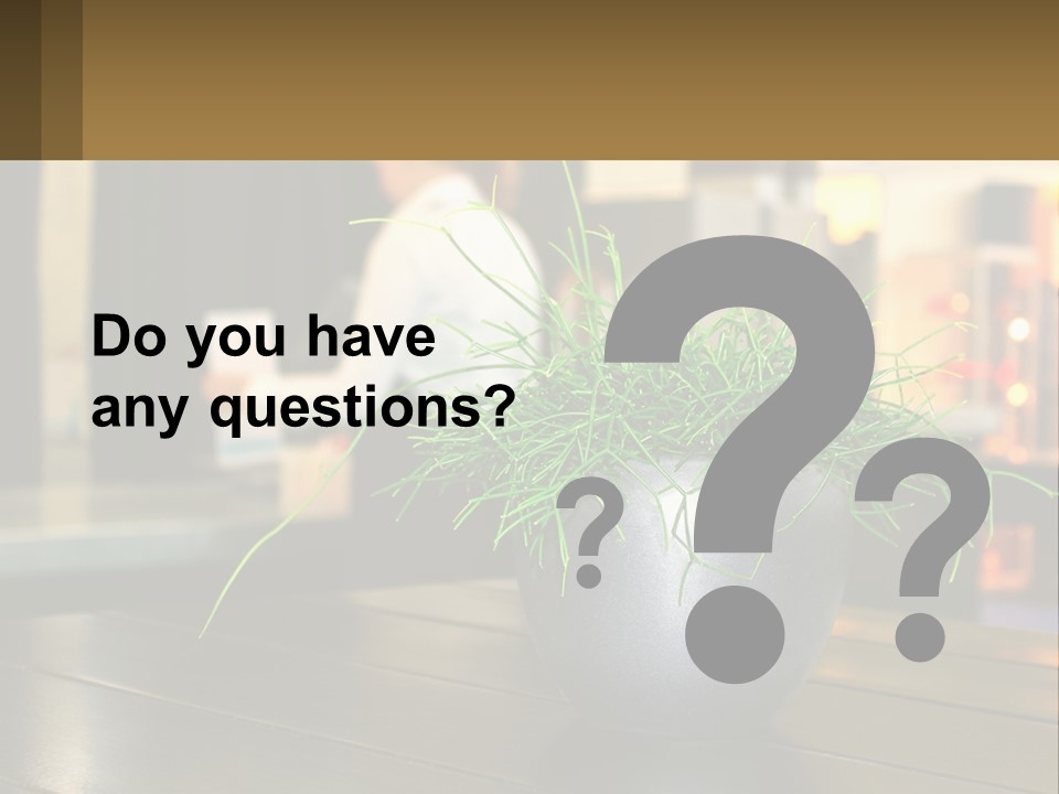 A Plant Is In A Vase On A Table PowerPoint Template