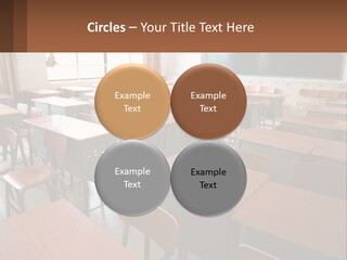 A Classroom With Desks And A Chalk Board PowerPoint Template