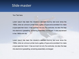 A Man Riding Skis Down A Snow Covered Slope PowerPoint Template