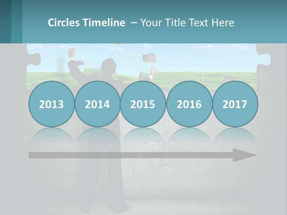 A Man In A Suit Is Holding A Puzzle Piece PowerPoint Template