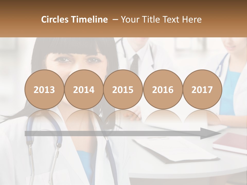 A Woman With A Stethoscope Sitting At A Table PowerPoint Template