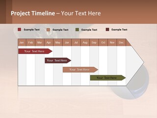 A Cat Sitting Next To A Blue Bowl On A Wooden Floor PowerPoint Template