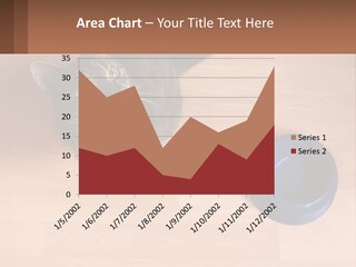 A Cat Sitting Next To A Blue Bowl On A Wooden Floor PowerPoint Template
