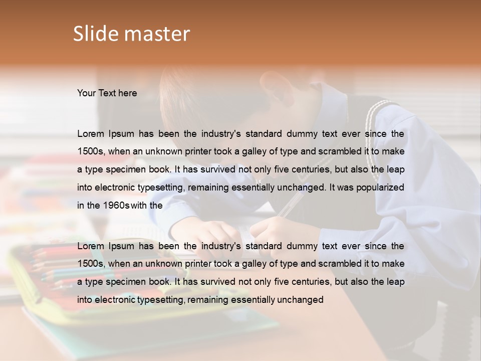 A Young Boy Writing On A Piece Of Paper PowerPoint Template