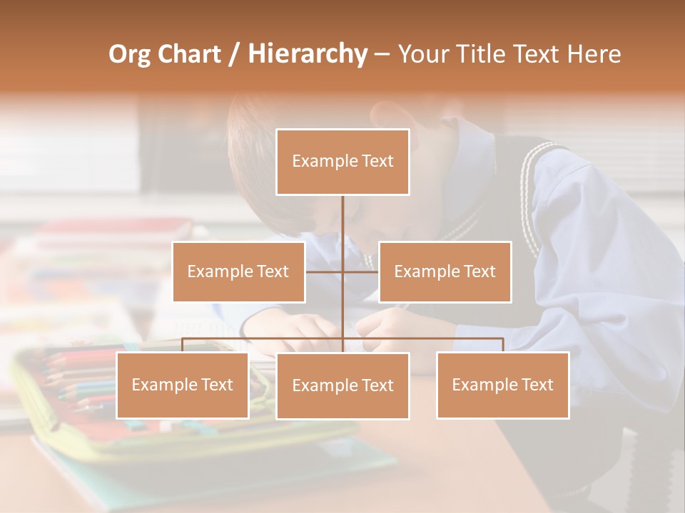A Young Boy Writing On A Piece Of Paper PowerPoint Template