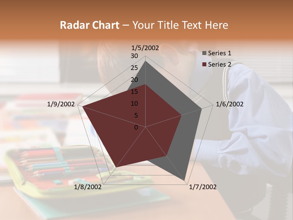 A Young Boy Writing On A Piece Of Paper PowerPoint Template