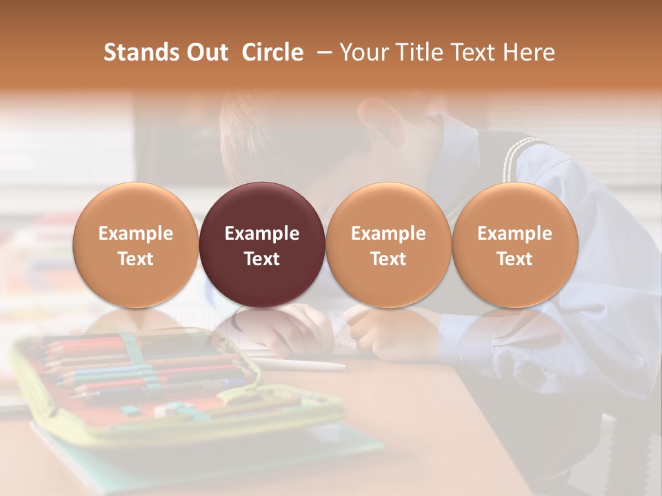 A Young Boy Writing On A Piece Of Paper PowerPoint Template