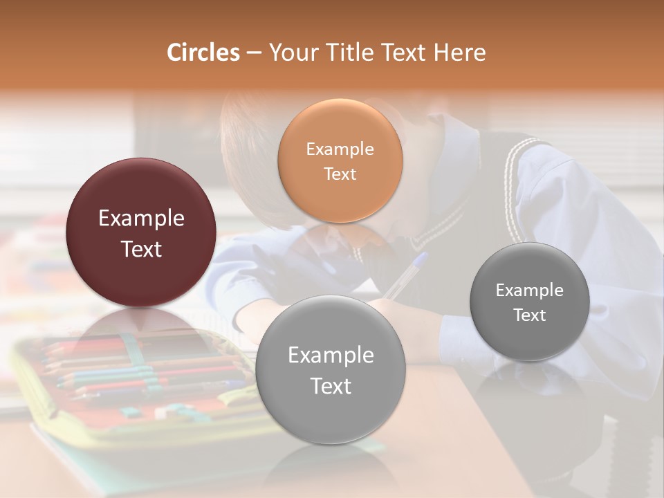 A Young Boy Writing On A Piece Of Paper PowerPoint Template