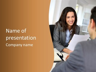 A Woman Sitting At A Desk In Front Of A Man PowerPoint Template
