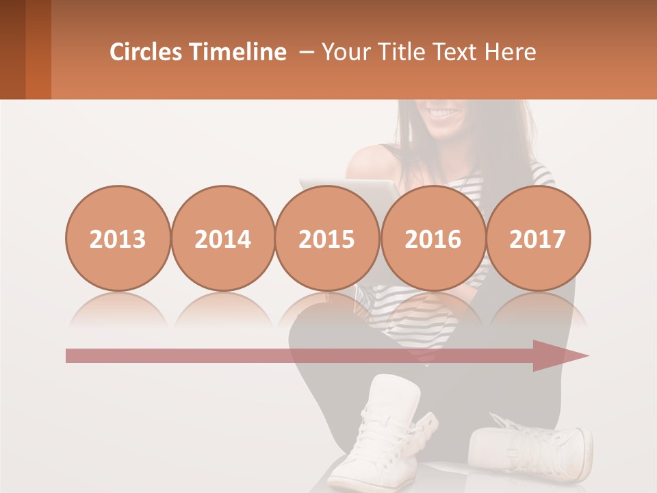 A Woman Sitting On The Floor Using A Tablet PowerPoint Template