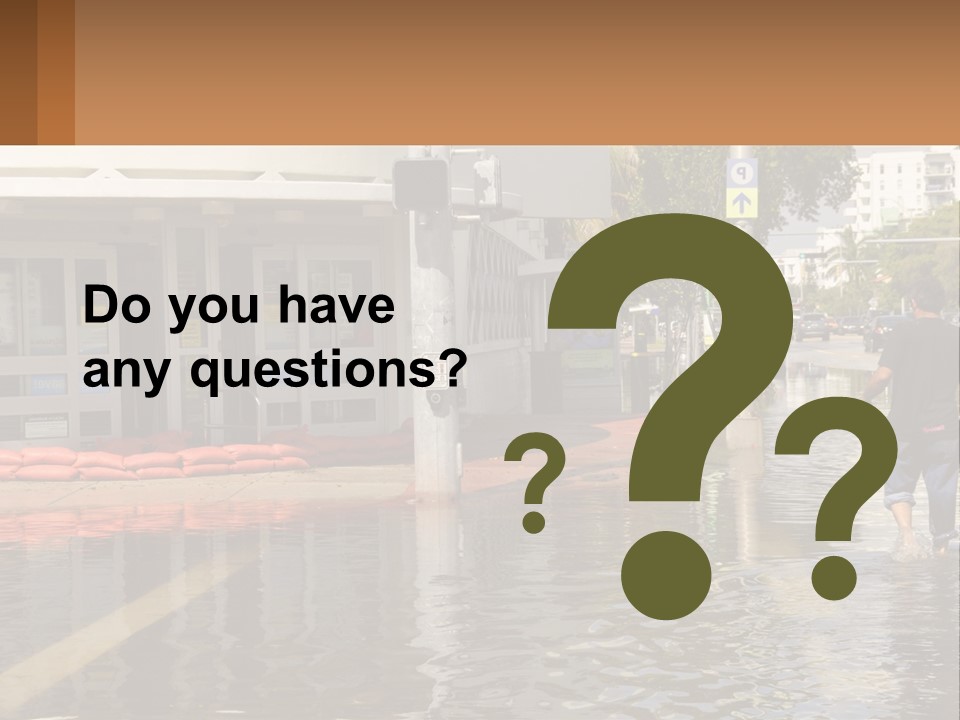 A Man Walking Down A Flooded Street Past A Building PowerPoint Template