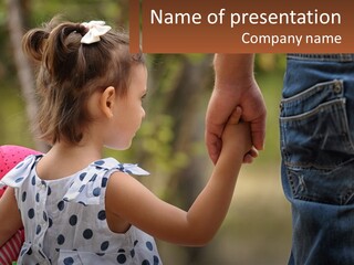 A Little Girl Holding The Hand Of A Man PowerPoint Template