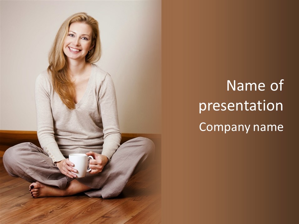 A Woman Sitting On The Floor Holding A Cup Of Coffee PowerPoint Template