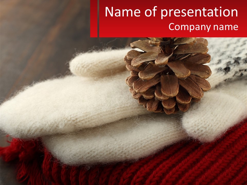 A Knitted Hat With A Pine Cone On Top Of It PowerPoint Template