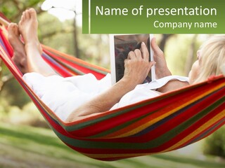 A Woman Laying In A Hammock Reading A Book PowerPoint Template