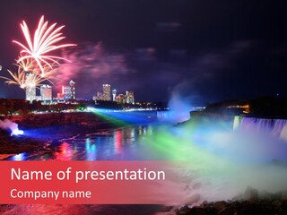 A Fireworks Display Over A Waterfall With A City In The Background PowerPoint Template
