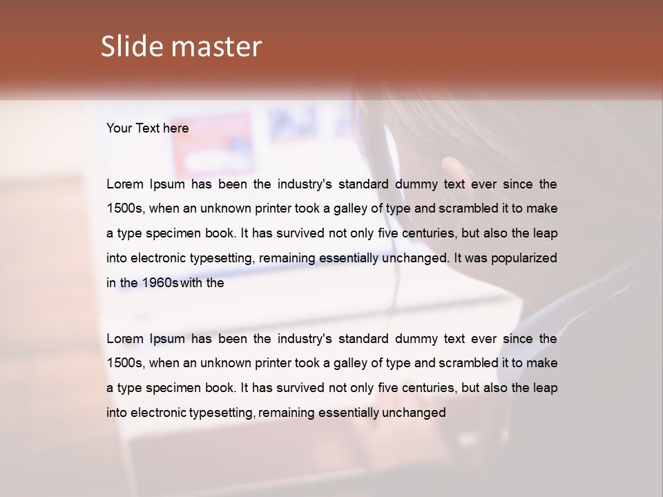 A Young Girl Is Looking At A Computer Screen PowerPoint Template