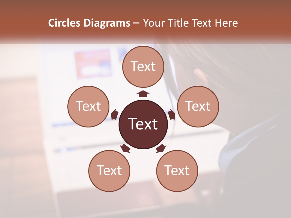 A Young Girl Is Looking At A Computer Screen PowerPoint Template