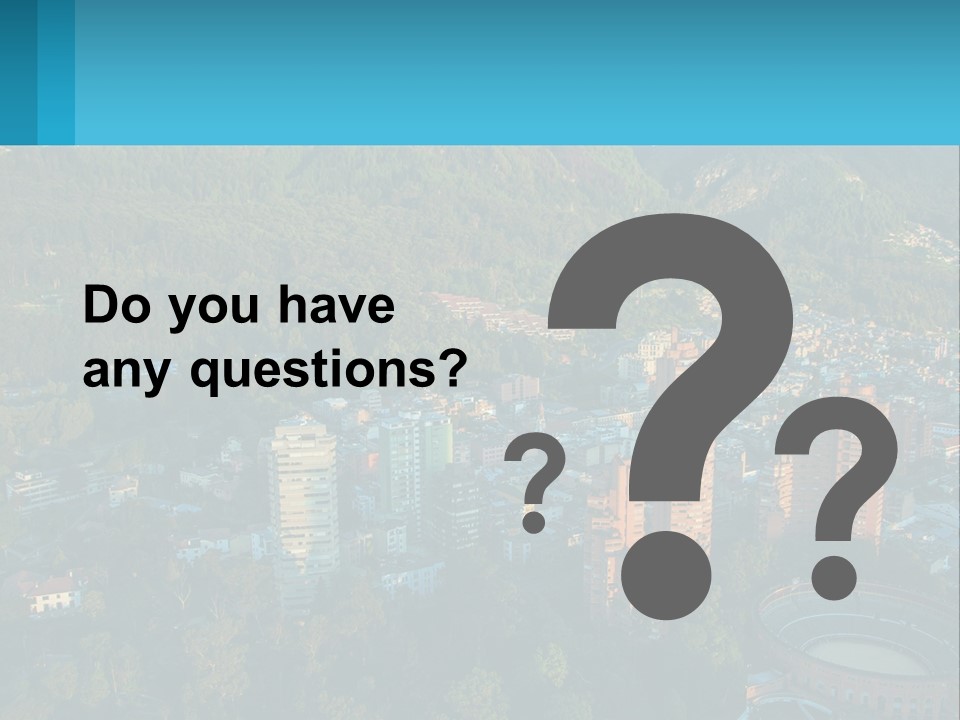 An Aerial View Of A City With Mountains In The Background PowerPoint Template