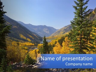 A Scenic View Of A Mountain Range With A River In The Foreground PowerPoint Template